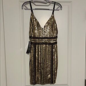 A Orach Elegant Gold Sequin Mini Dress